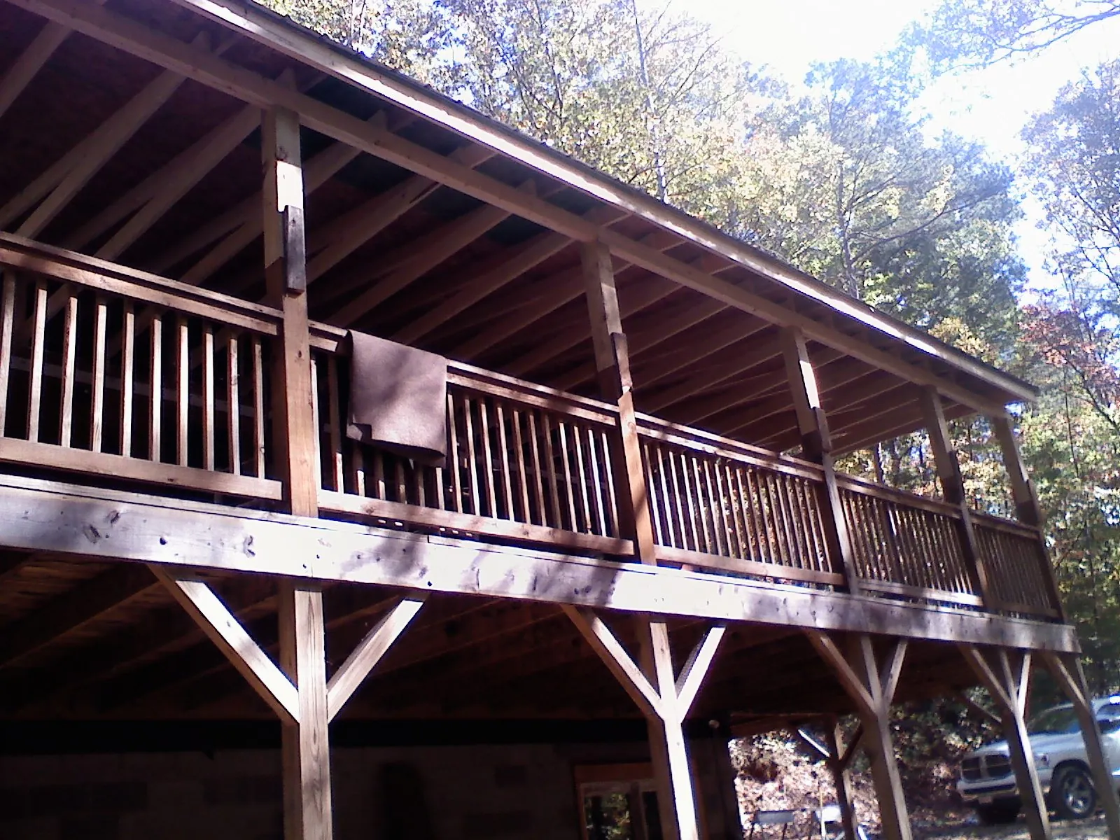 Timber framing under a new elevated porch and deck — Roof Leak Repair in Ponca City by Roofing Brothers